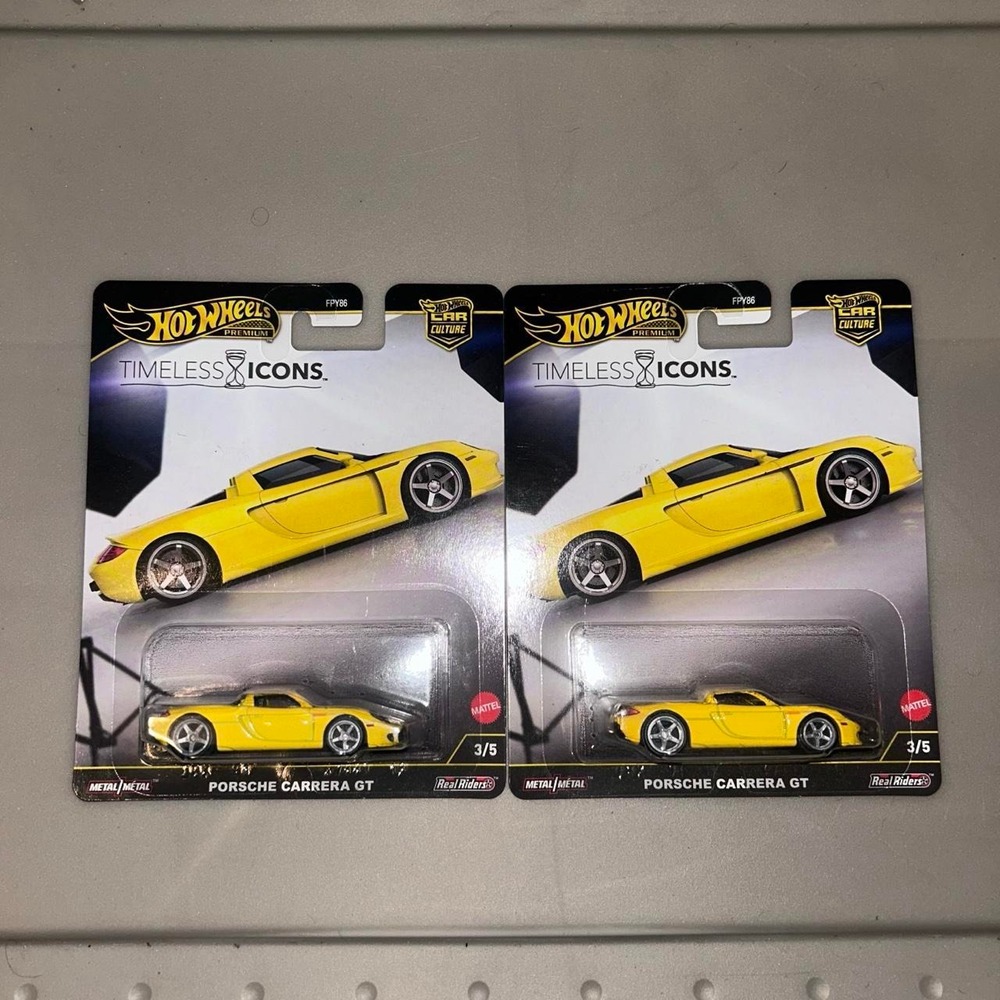 Hot Wheels Premium Porsche Carrera GT Yellow 2 Car Diecast Bundle